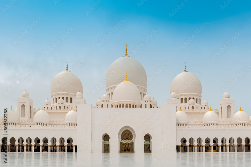 Exterior shot of Abu Dhabi's Sheikh Zayed Grand Mosque during daytime