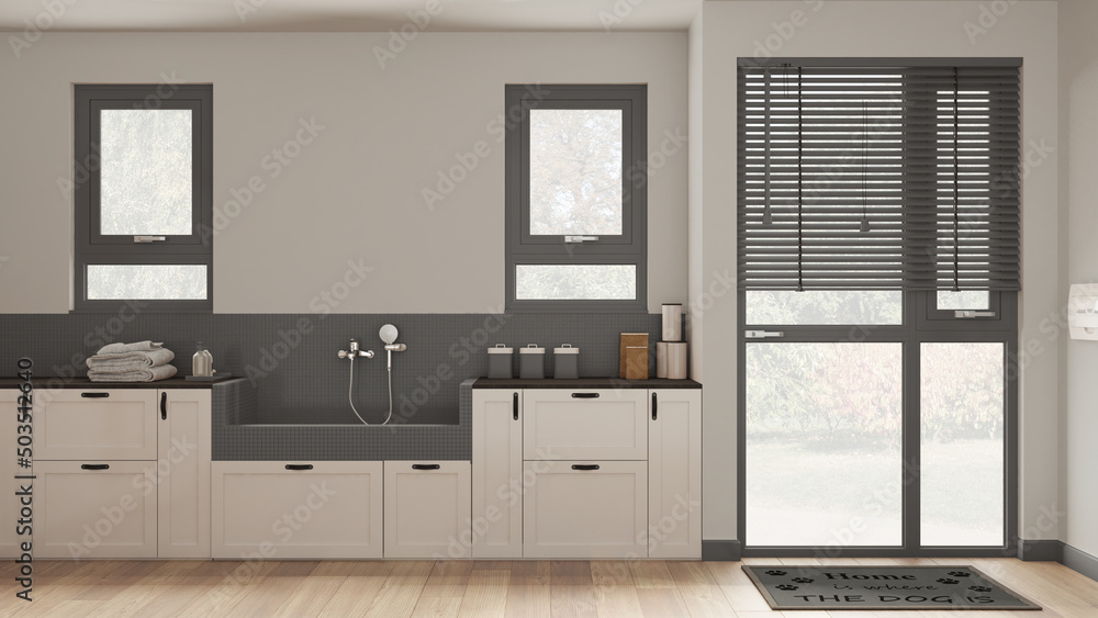 Space devoted to pet, modern laundry room in dark tones with cabinets and dog bath shower with mosaic tiles and faucet. Parquet floor and windows. Cozy mudroom interior design concept Space devoted to pet, modern laundry room in dark tones with cabinets and dog bath shower with mosaic tiles and faucet. Parquet floor and windows. Cozy mudroom interior design concept