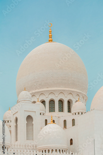 Detailed exterior photo of the Sheikh Zayed Mosque in Abu Dhabi, United Arab Emirates
