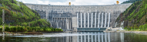 800 fts arched gravity reinforced concrete dam of hydroelectric power plant. High resolution photo, 46 Mpix.