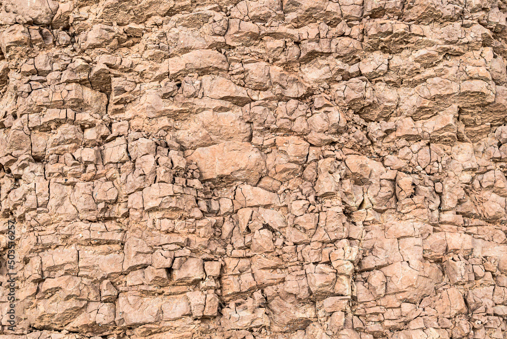Mountain cracked earth wall background. texture, nature Mountain cracked earth wall background. texture, nature