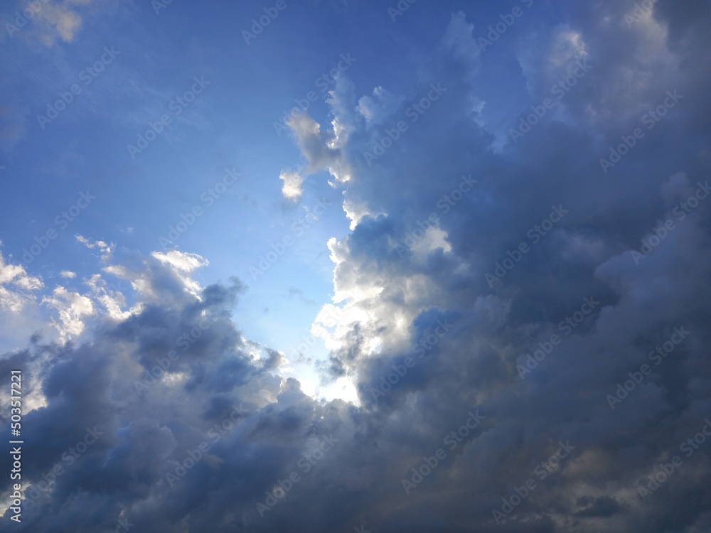 sun light behind the stratocumulus cloud beautiful sky heaven light