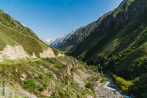 Alpine narrow valley on a sunny summer day.