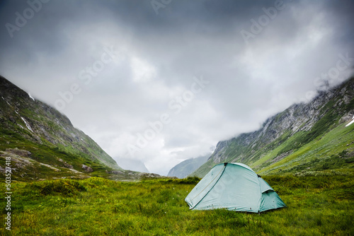 Camping tent in a morning light