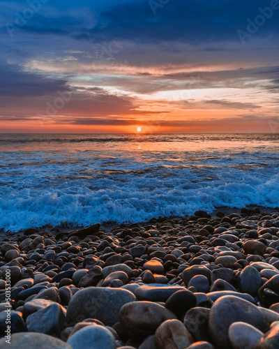 sunset on the beach © Renzo