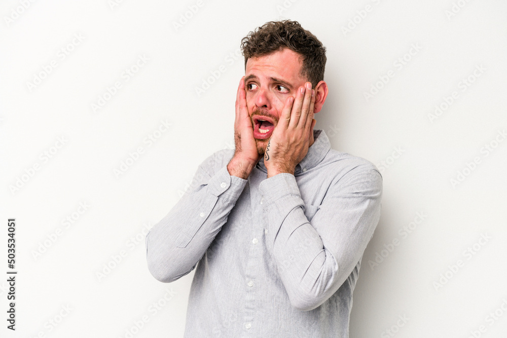 Young caucasian man isolated on white background scared and afraid. Young caucasian man isolated on white background scared and afraid.