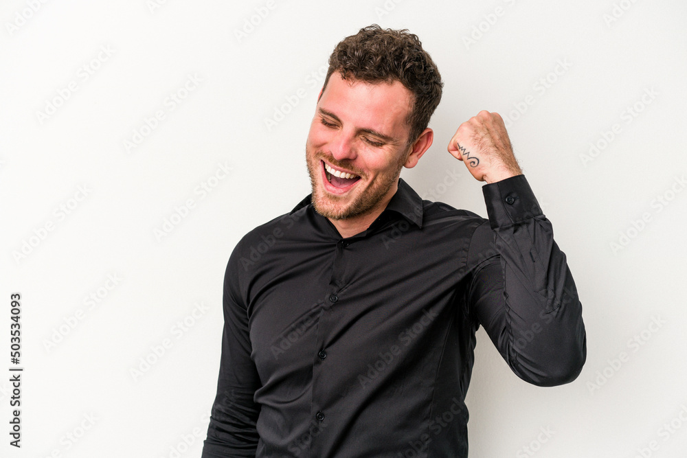 Young caucasian man isolated on white background celebrating a victory, passion and enthusiasm, happy expression. Young caucasian man isolated on white background celebrating a victory, passion and enthusiasm, happy expression.