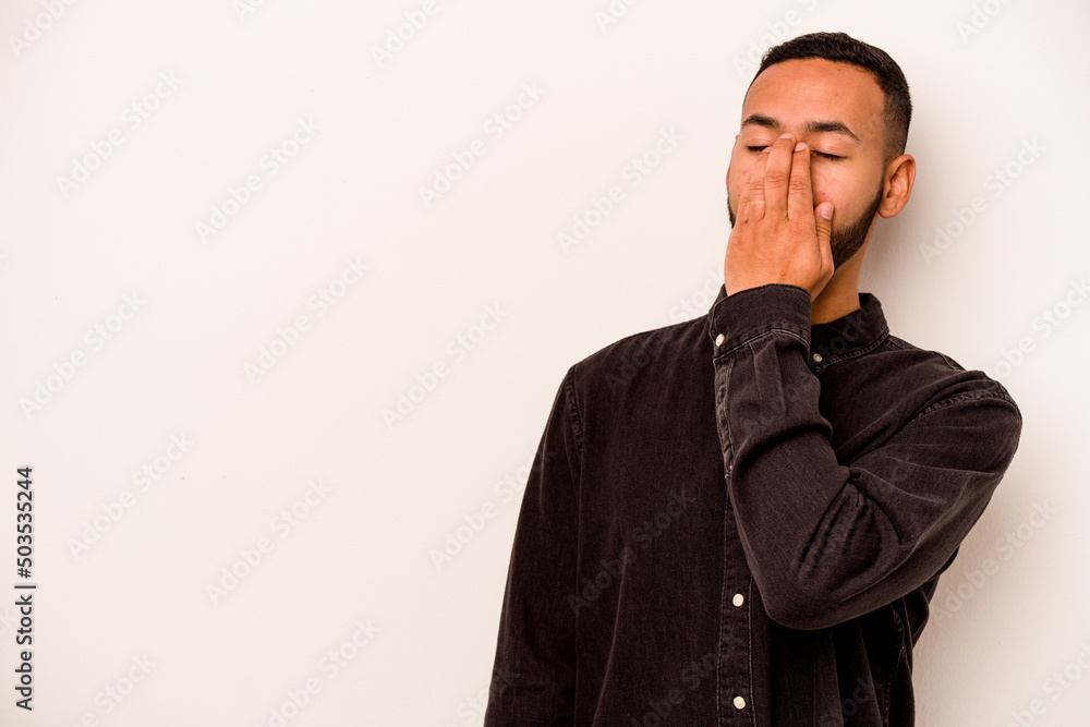 Young hispanic man isolated on white background laughing happy, carefree, natural emotion. Young hispanic man isolated on white background laughing happy, carefree, natural emotion.