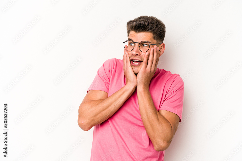 Young caucasian man isolated on white background scared and afraid. Young caucasian man isolated on white background scared and afraid.