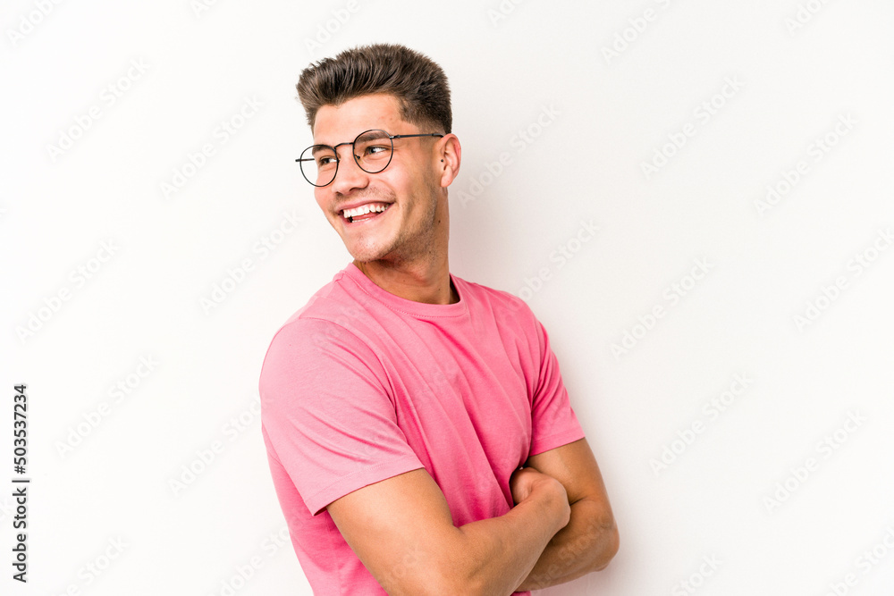 Young caucasian man isolated on white background laughing and having fun. Young caucasian man isolated on white background laughing and having fun.