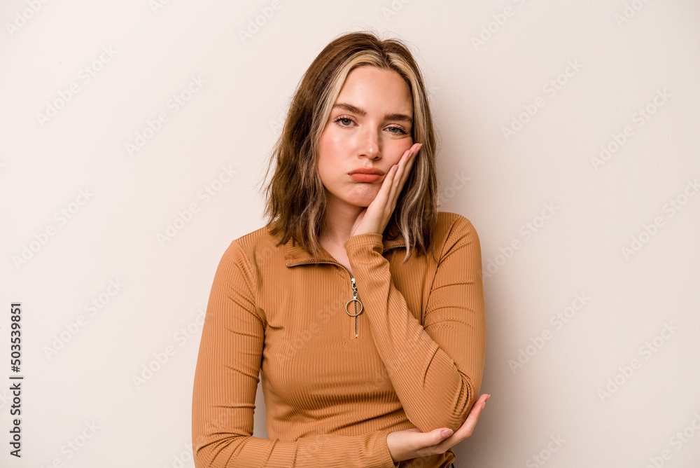 Young caucasian woman isolated on white background who is bored, fatigued and need a relax day. Young caucasian woman isolated on white background who is bored, fatigued and need a relax day.