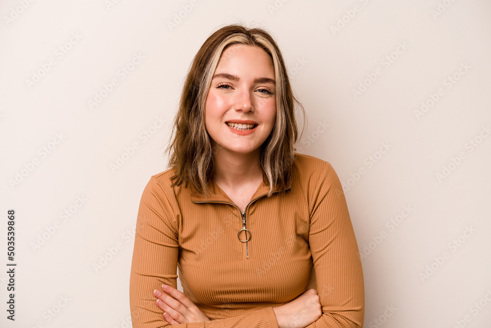 Fototapeta premium Young caucasian woman isolated on white background laughing and having fun.