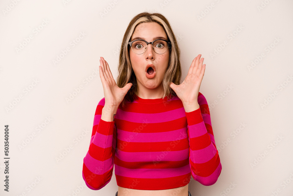Young caucasian woman isolated on white background surprised and shocked. Young caucasian woman isolated on white background surprised and shocked.