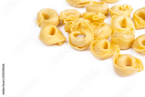 Raw fresh tortellini pasta isolated on white background