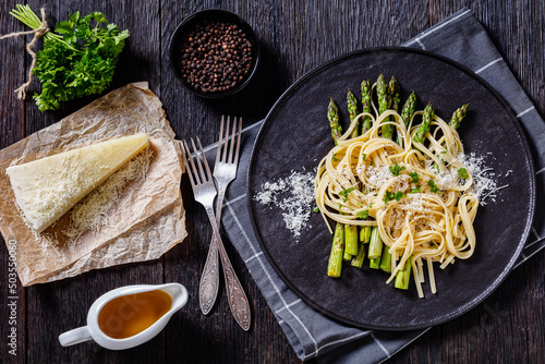 roasted asparagus with pasta, cheese on plate