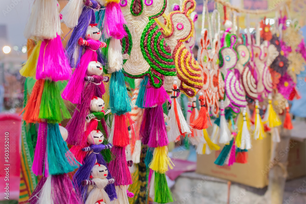 Handmade jute dolls, colourful handicrafts on during Handicraft Fair in Kolkata - the biggest handicrafts fair in Asia.