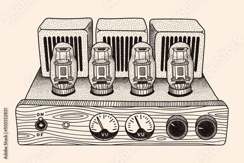 Vintage tube amplifier with indicators for listening to music. Device isolated on a beige background.