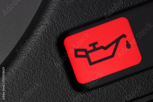 oil pressure warning light in car dashboard photo