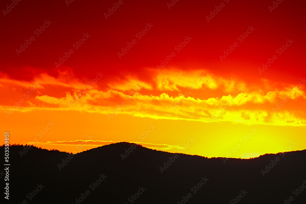 Colorful red and orange sunset over the hills in Slovakia
