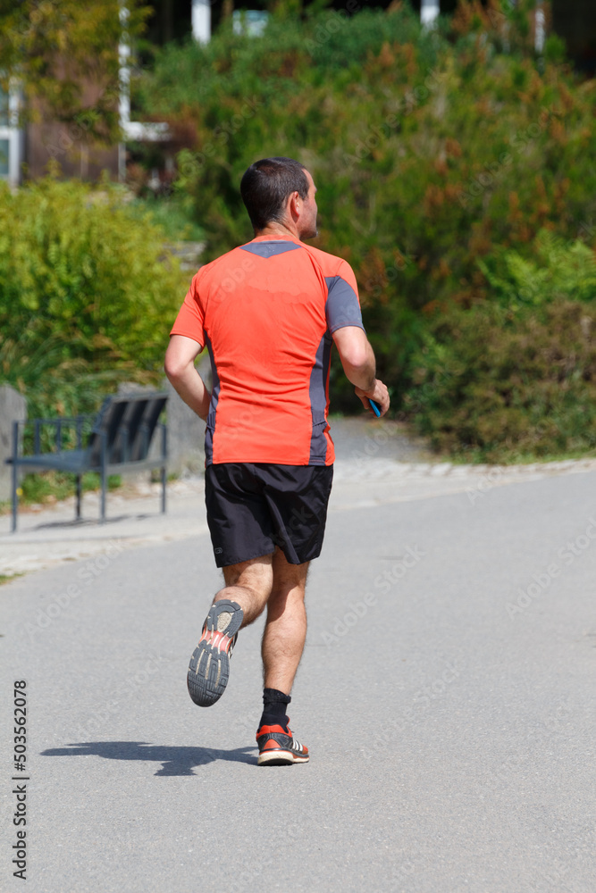 Man running in a park Man running in a park