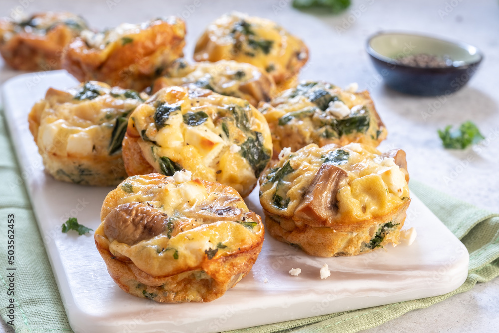Vegetarian egg muffins with mushroom, green kale and feta cheese for Healthy keto diet Breakfast or lunch Vegetarian egg muffins with mushroom, green kale and feta cheese for Healthy keto diet Breakfast or lunch
