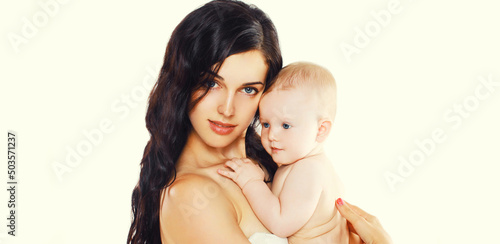 Portrait of happy mother holding cute baby on white background, blank copy space for advertising text