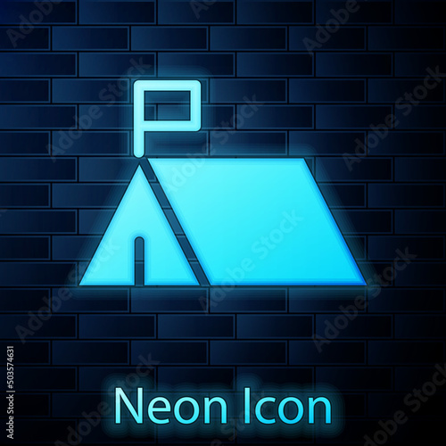Glowing neon Protest camp icon isolated on brick wall background. Protesting tent. Vector