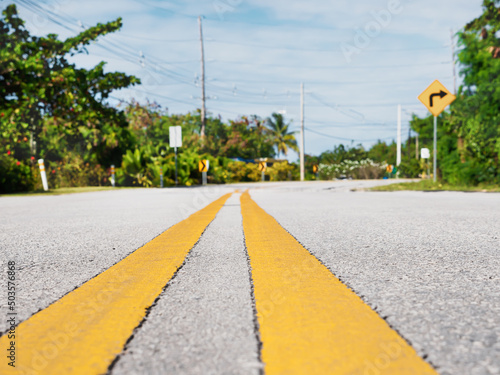 Traffic road sign turn right on empty highway without cars in Dominican Republic photo