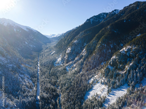 Aerial winter view of Rila Mountain near Beli Iskar river, Bulgaria photo