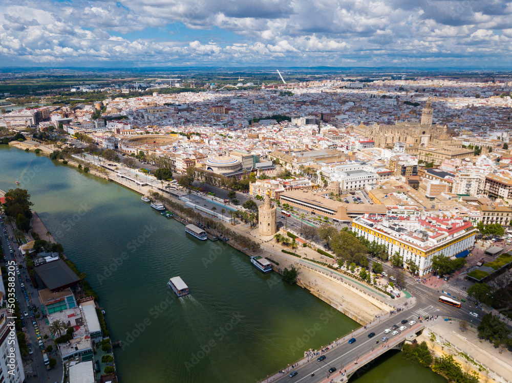 Fototapeta premium Aerial view Sevilla of city center with embankment of Guadalquivir. Spain