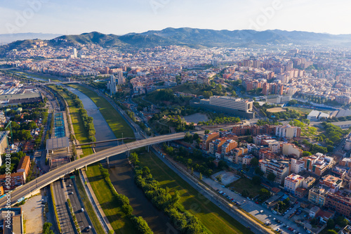 Aerial urban landscape of Santa Coloma de Gramenet municipality and Besos river  Catalonia  Spain