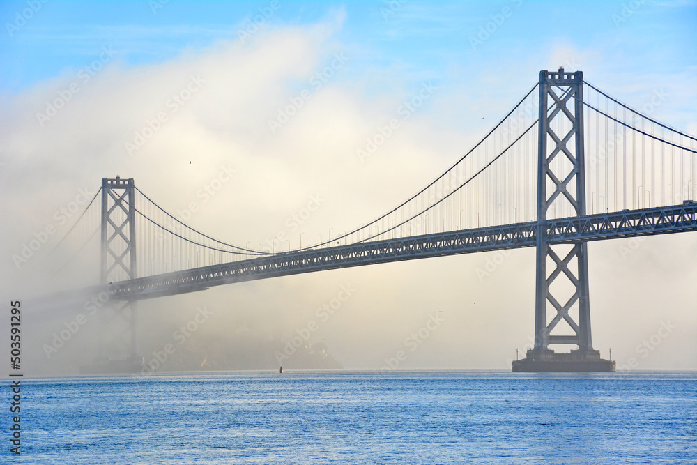 Fog surrounding the Oakland Bay Bridge in San Francisco, California Fog surrounding the Oakland Bay Bridge in San Francisco, California