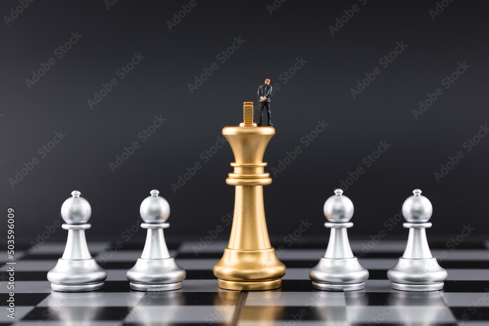 The target chess piece of the businessman in the miniature world The target chess piece of the businessman in the miniature world