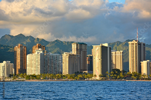 Honolulu and Waikiki city skyline view with mountains in the background and ocean in the foreground on Oahu  Hawaii