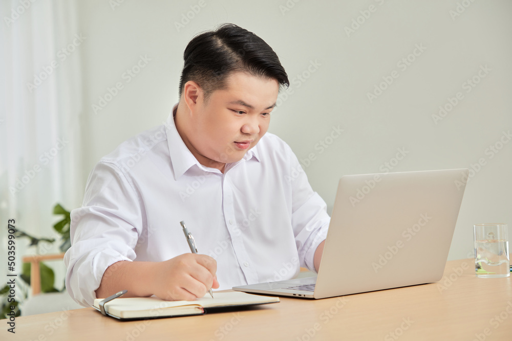 A moment of business man work at home with laptop in living room A moment of business man work at home with laptop in living room