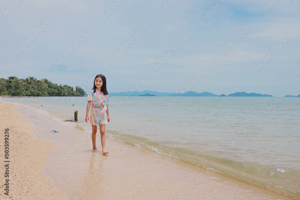 traveller little girl enjoying on the Beach traveller little girl enjoying on the Beach