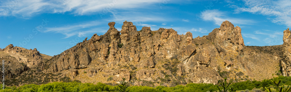 Fototapeta premium Valley with rocky formation of mountains with ancient erosions