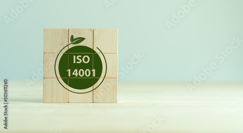 ISO 14001 certified environmental management systems. Requirements for an environmental management system for organization can use to enhance environmental performance..ISO 14001 on wooden cubes.