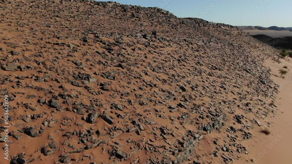 Aerial forward view over desolate rocky Moroccan desert Aerial forward view over desolate rocky Moroccan desert