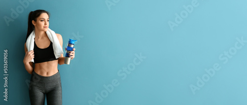 Sporty young woman with bot...