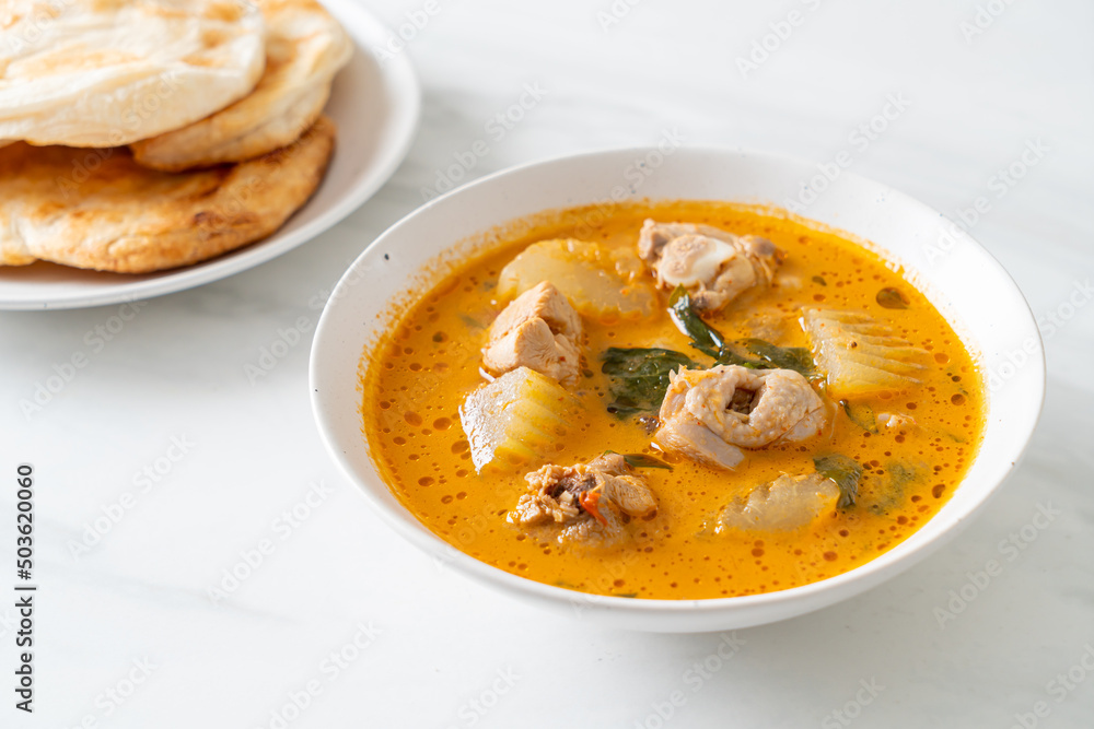 Chicken curry soup with roti Chicken curry soup with roti