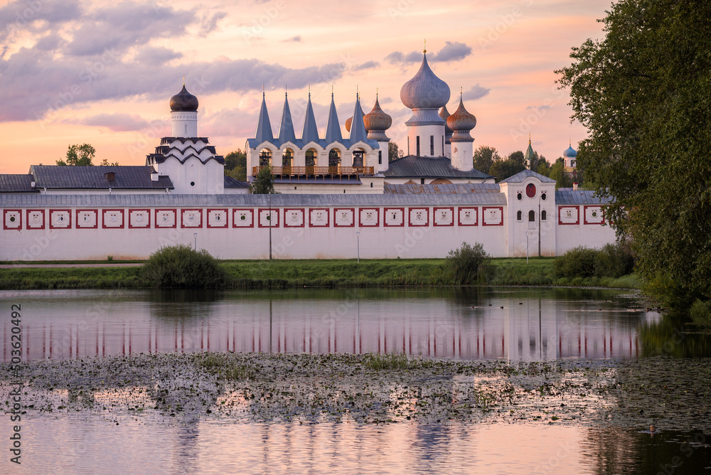 August twilight at the ancient Tikhvin Assumption Monastery. Leningrad region, Russia