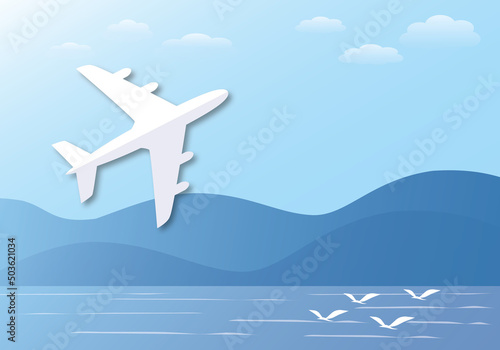 Fototapeta Naklejka Na Ścianę i Meble -  White paper airplane flying in the sky background with mountains, seagull and sea. Travel by air transport concept. shadow overlay. space for the text. illustration paper cut design style.