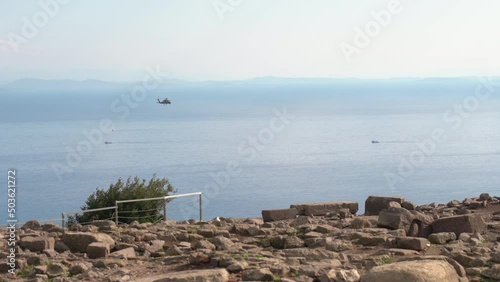 NATO military helicopter off the coast of Turkey near the Greek island of Lesvos. photo