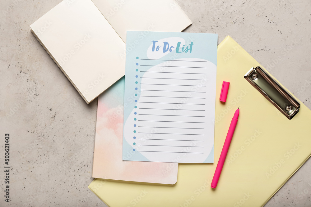 Blank to do list, opened notebook, clipboard and pen on grunge background Blank to do list, opened notebook, clipboard and pen on grunge background