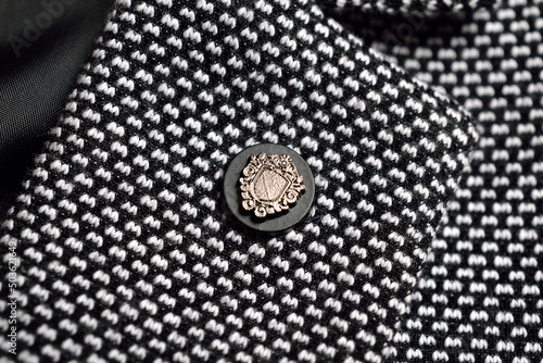 Closeup of Lapel Pin on Blazer photo