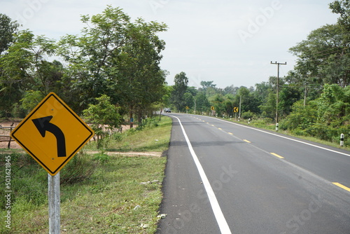 left curve warning sign for travel safety