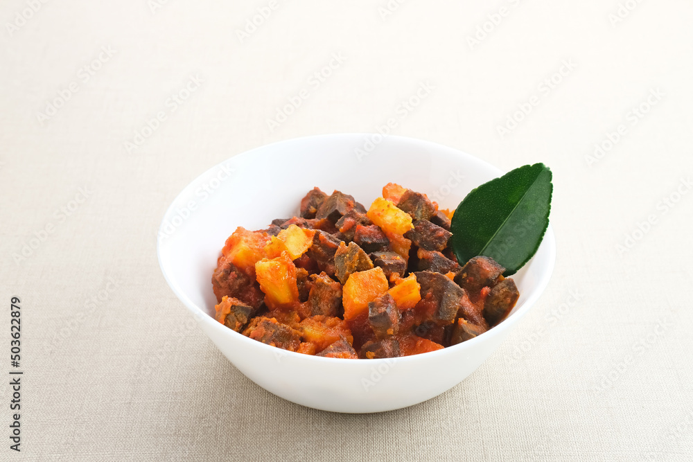 Sambal Goreng Ati Kentang, javanese (Indonesia) traditional food. Served in white bowl Sambal Goreng Ati Kentang, javanese (Indonesia) traditional food. Served in white bowl