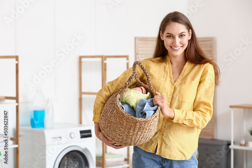 Beautiful housewife holding...