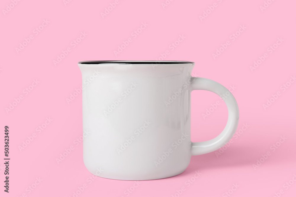 Ceramic mug on pink background Ceramic mug on pink background